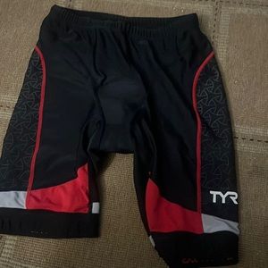 TYR cycling shorts with zipper in back. Black and red